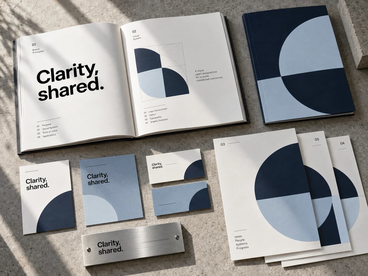 An editorial visual system expressed across a brand guidelines book and internal communication materials.